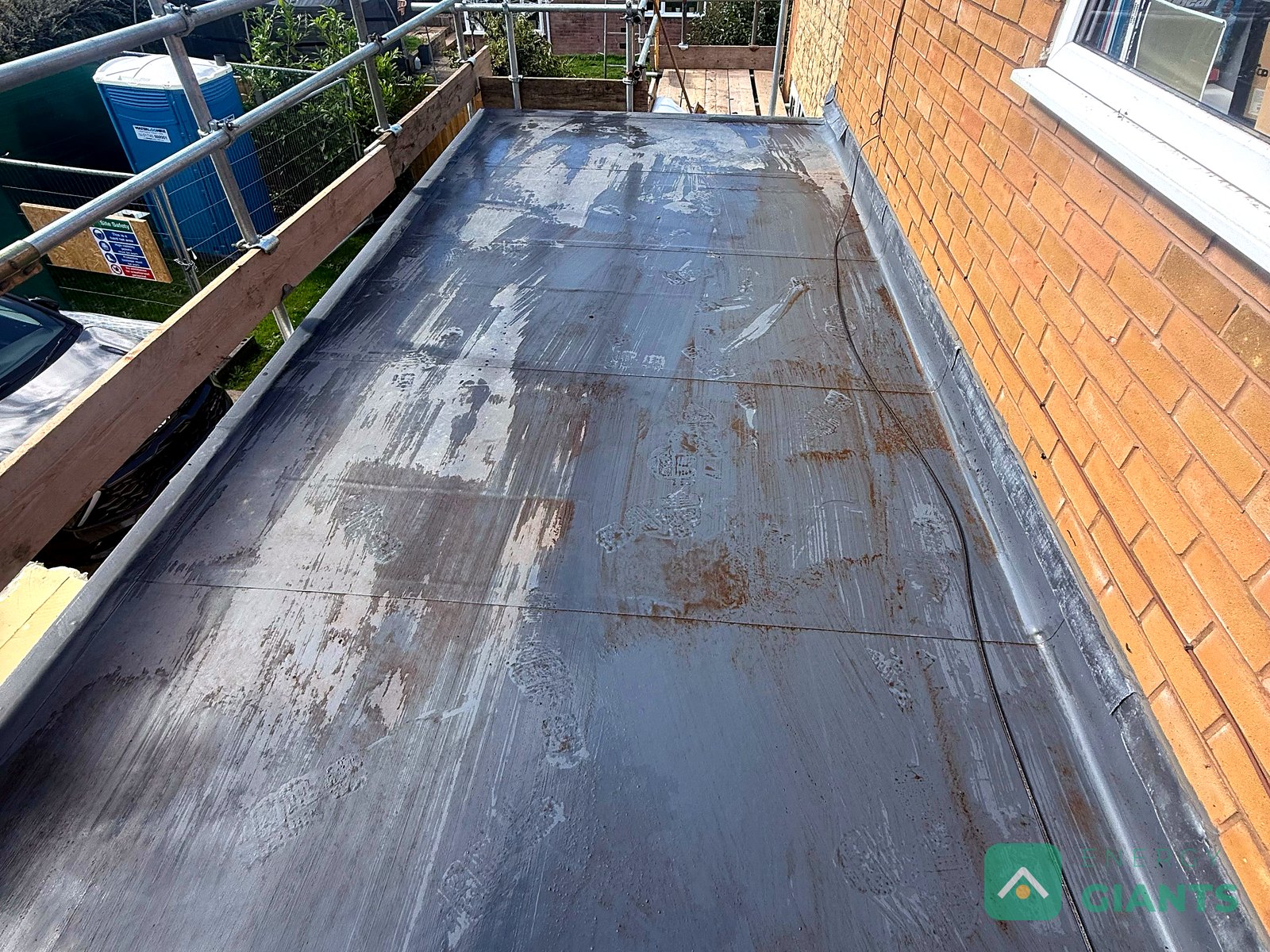The garage roof in Ruthin stripped back to the bare timber deck