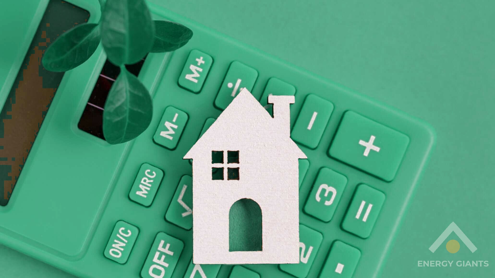 A white model house on a green calculator: working out how to pay for a greener home