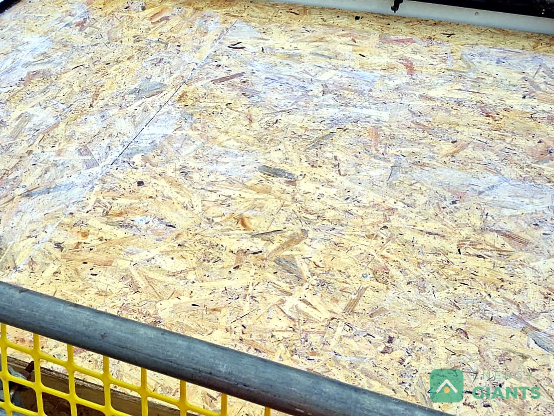New OSB deck laid over the insulation on the extension roof