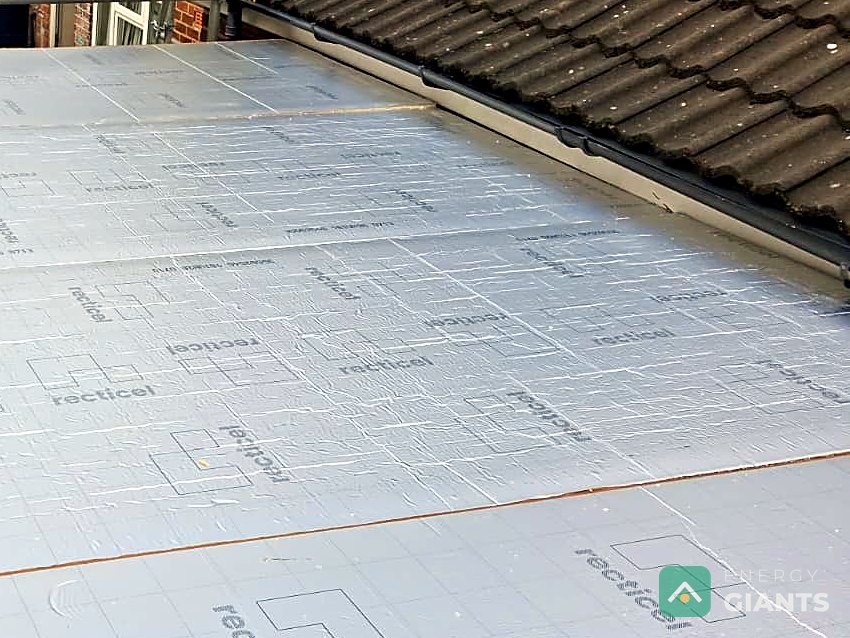 Recticel PIR insulation boards laid across a flat roof in Litherland by our crew