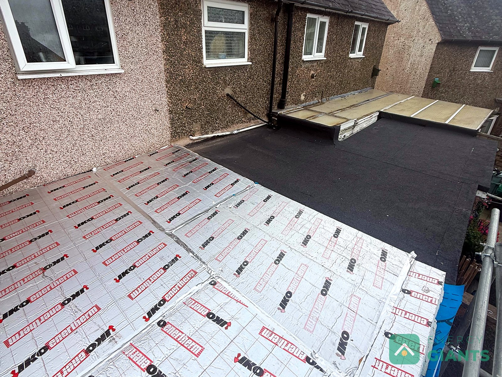 Foil faced PIR insulation boards laid across the whole extension roof, edge to edge