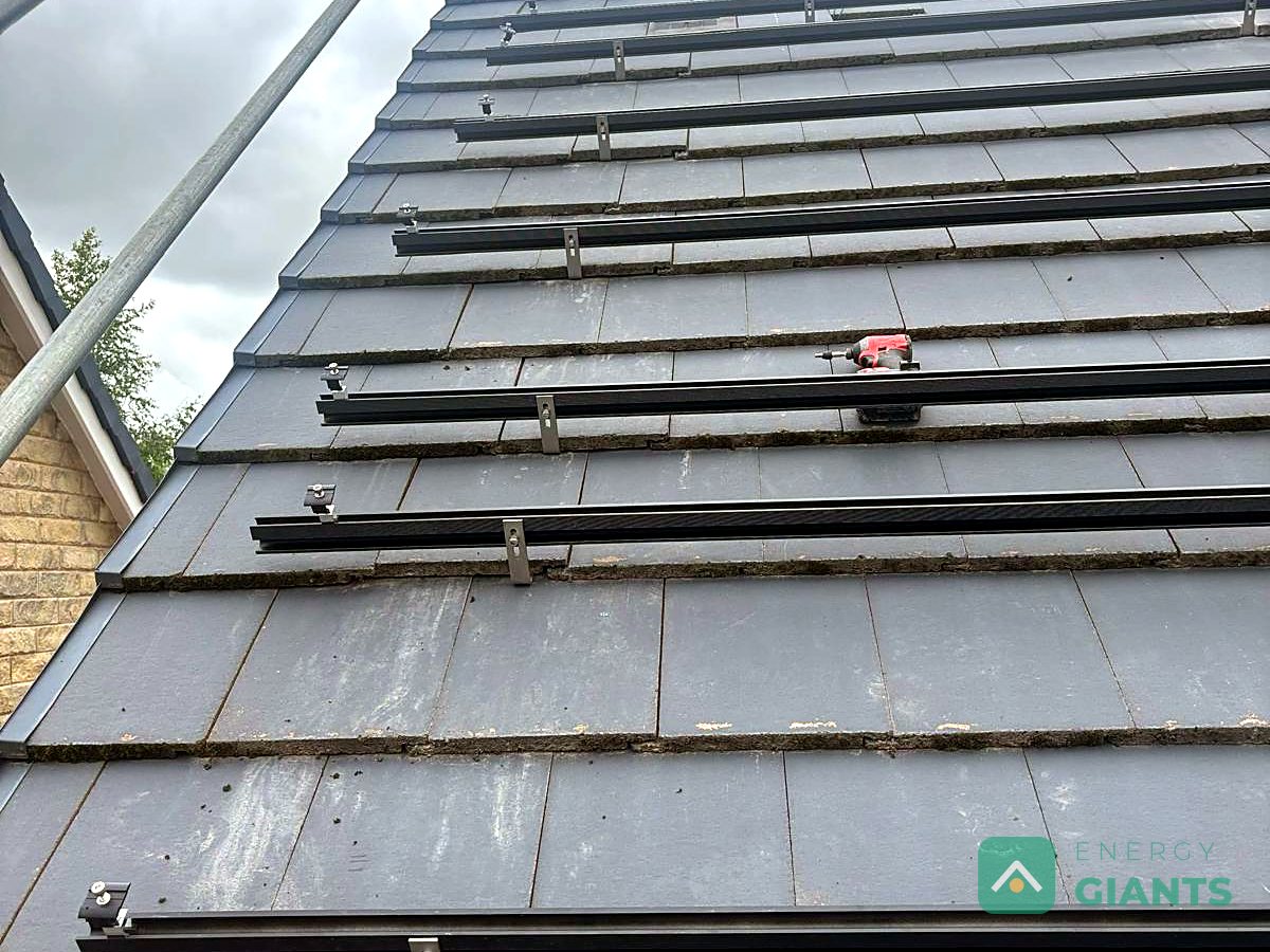 Mounting rails fixed across the tiled roof