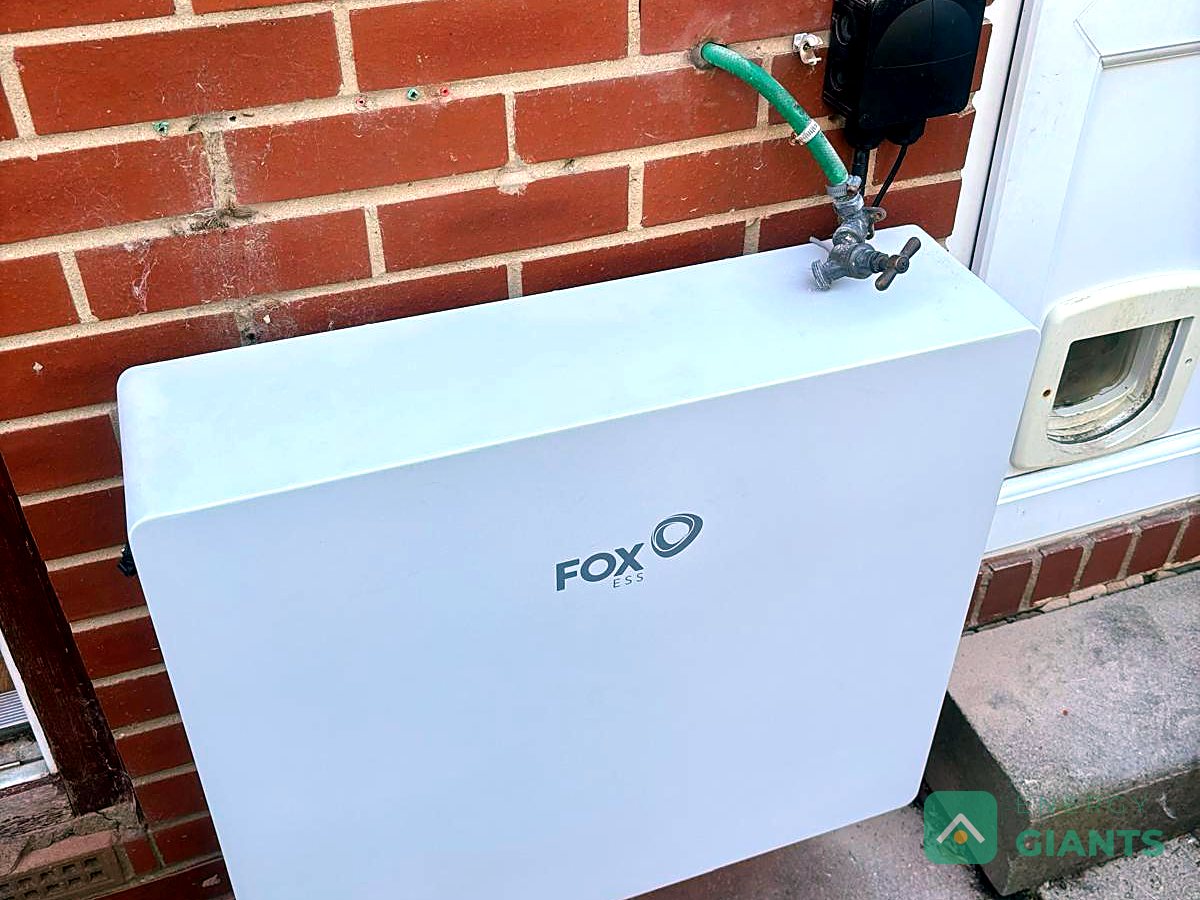 The Fox ESS battery mounted at ground level on the rear wall