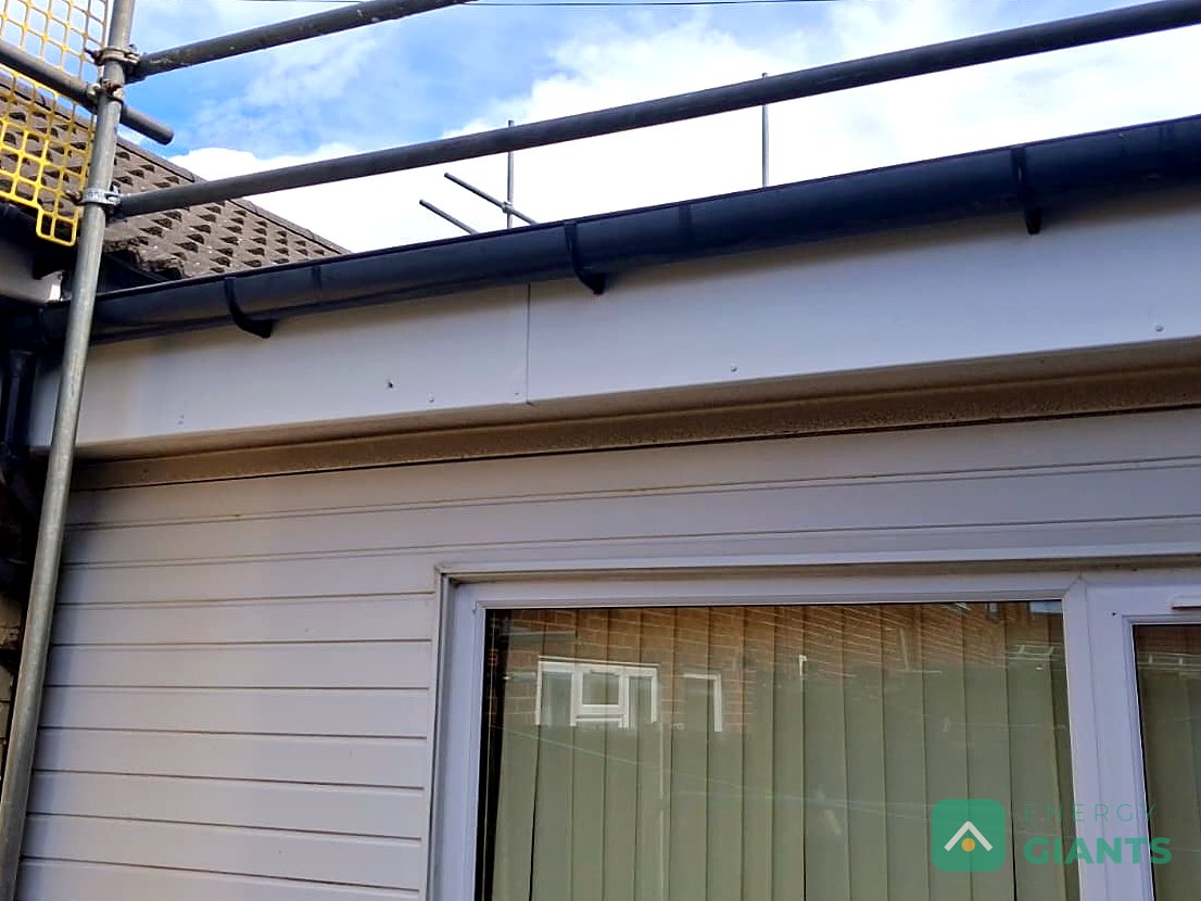 New white fascia boards along the front of the extension in Litherland, matched to the existing cladding