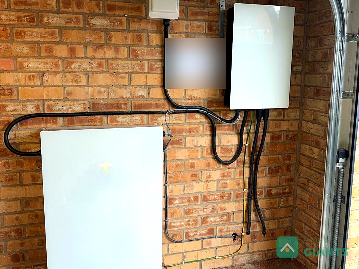 The Tesla Powerwall 3 and Backup Gateway on the garage wall