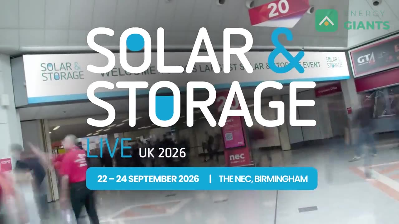 Visitors arriving at Solar and Storage Live under the welcome sign at the NEC, Birmingham